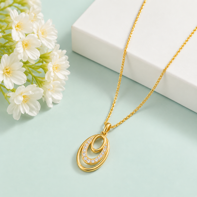 Gold Oval Pendant with White Stones