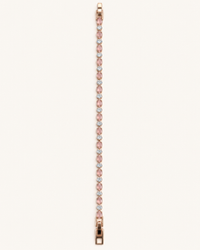 Rose gold tone blush pink bracelet featuring alternating oval pink stones and sparkling clear round stones on a light background.