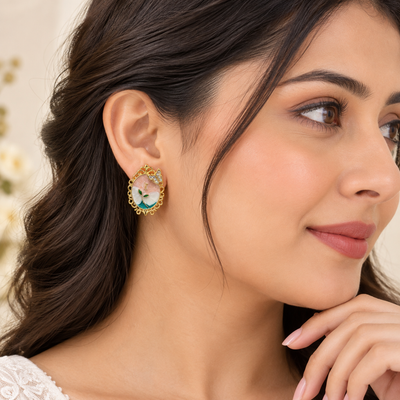 Elegant multicolor floral stud earrings with crystal accents and ornate gold-tone frame