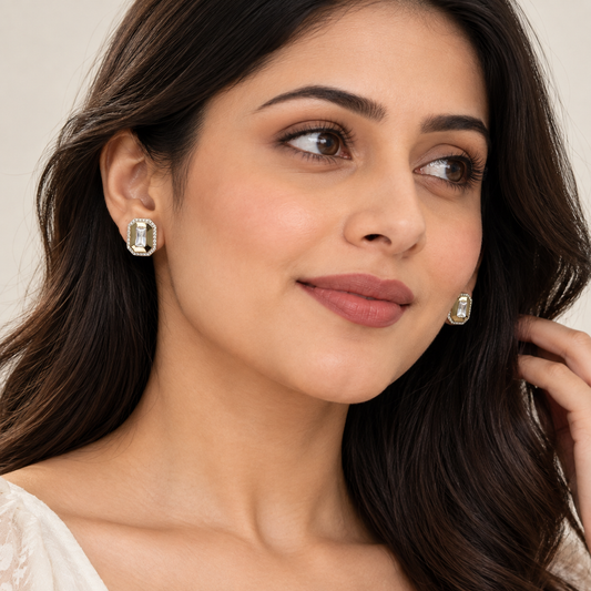 Geometric gold earrings with clear crystal centre