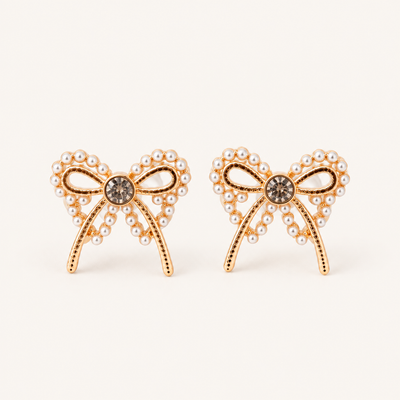 Pearl bow stud earrings with gold-tone finish