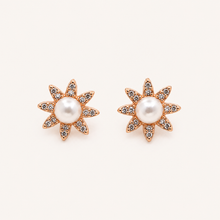 Pearl flower stud earrings in rose gold tone