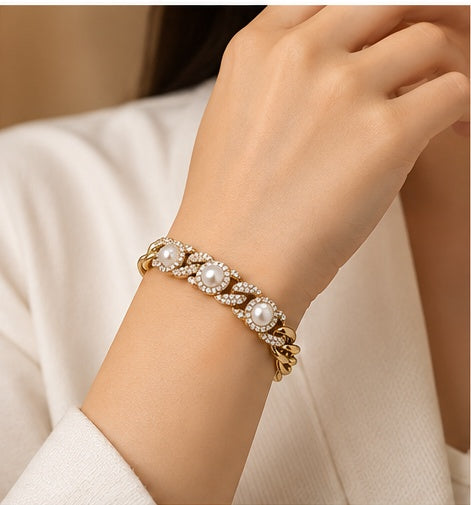 Woman wearing gold pearl and crystal chain bracelet on wrist - Anovra CB-039
