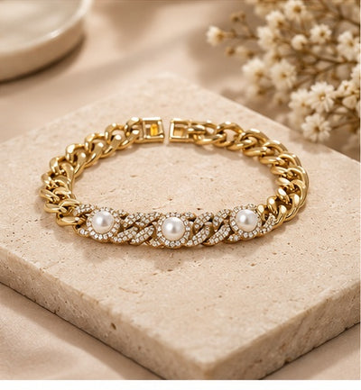 Gold pearl and crystal chain bracelet styled with minimal neutral props - Anovra CB-039